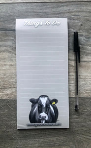 Cow with tag to do list notepad