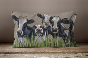 Row Of Friesian Cows Through Grass Oblong Cushion